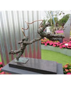 Gnarled tree sculpture displayed at The Kildare Gallery outdoor exhibition.