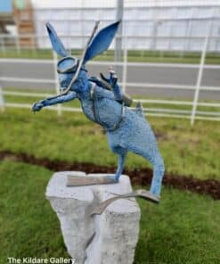 Blue metallic insect sculpture at The Kildare Gallery, contemporary art installation.