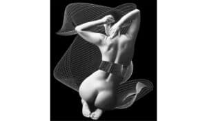 Wall art featuring a black and white abstract female figure with geometric wireframe elements.