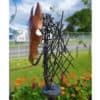Metal horse sculpture outdoor art piece.
