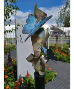 Butterfly metal sculpture in an outdoor garden at The Kildare Gallery, Irish contemporary art display.