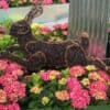 Wicker rabbit ornament among colourful hydrangea flowers at The Kildare Gallery.