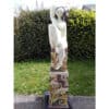 Elegant female sculpture with flowing hair, located outdoors at The Kildare Gallery, showcasing contemporary Irish art.