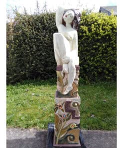 Elegant female sculpture with flowing hair, located outdoors at The Kildare Gallery, showcasing contemporary Irish art.