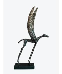 Whimsical dragonfly sculpture by The Kildare Gallery, contemporary art piece, metal artwork, unique garden decor relevance.