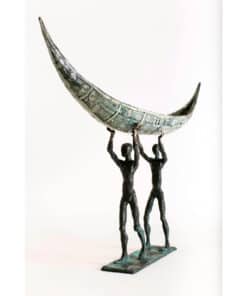 Shining sculpture of two figures holding a crescent moon made of currency notes, modern art piece at The Kildare Gallery.
