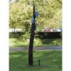 Bright blue glass cherry blossom sculpture on a dark wooden pole at The Kildare Gallery.