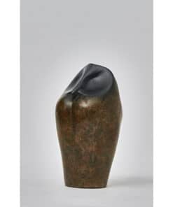Contemporary abstract sculpture displayed at The Kildare Gallery in Ireland, blending natural stone and polished black material for modern art.