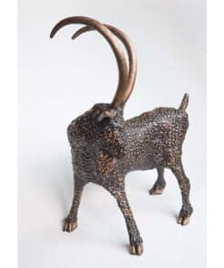 Rustic bronze goat sculpture with textured finish, displayed at The Kildare Gallery.