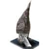 Bronze sculpture of a pointed abstract figure, displayed at The Kildare Gallery in Ireland.