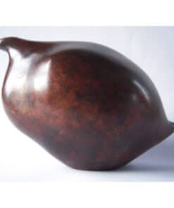 Elegant ceramic bird sculpture with a glossy finish, highlighting Irish artistic craftsmanship.