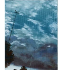 Vivid sky with clouds and lampposts reflected on water surface at The Kildare Gallery.