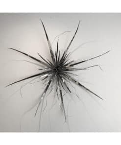Shiny metallic starburst sculpture by The Kildare Gallery, contemporary art piece on display.