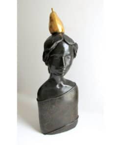 Bronze bust sculpture with a gold pear on head, displayed at The Kildare Gallery, Ireland.