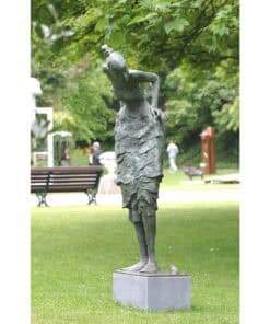 Contemporary bronze sculpture of a woman in the garden at The Kildare Gallery, outdoor art display.