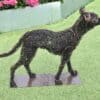 Whimsical wire sculpture of a dog outdoors at The Kildare Gallery.