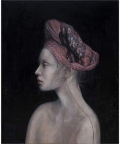 Intriguing portrait of a woman with a decorative headwrap at The Kildare Gallery.