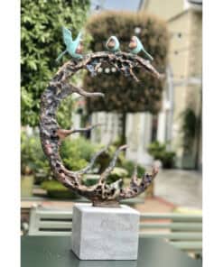 Beautiful bronze sculpture of seahorses on a crescent moon at The Kildare Gallery, perfect for art enthusiasts.