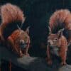 Vivid painting of two red squirrels on a tree branch, highlighting wildlife art at The Kildare Gallery.