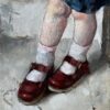 Children's legs in vintage shoes, partly clothed, painted in an impressionist style.