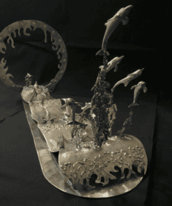 Dolphin sculpture made of metal featured at The Kildare Gallery, Irish contemporary art piece.