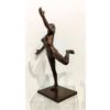 Elegant bronze sculpture of a woman in a dynamic running pose, displayed at The Kildare Gallery.