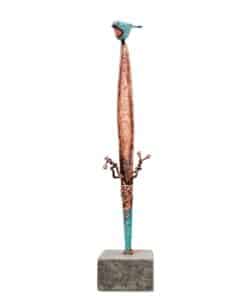 Vibrant bronze and turquoise sculpture of a bird perched on a long, ornate pole at The Kildare Gallery.