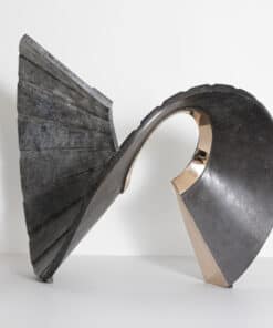 Rustic metal sculpture art piece with modern design, displayed at The Kildare Gallery.