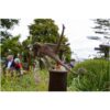 Unique bronze dancer sculpture at The Kildare Gallery outdoor exhibition, surrounded by lush garden and visitors.