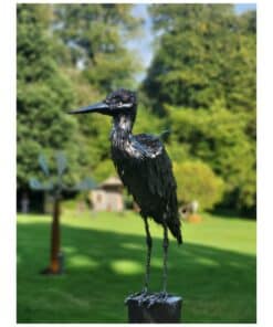 Rustic black metal heron sculpture outdoor art garden decor.