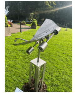 Modern metallic sculpture displayed outside The Kildare Gallery, Irish contemporary art piece, outdoor art installation, urban sculpture.
