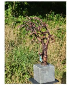 Twisted metal tree sculpture art installation at The Kildare Gallery garden outdoor exhibit.