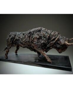 A bark-textured sculpture of a dog on display at The Kildare Gallery.