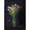 Vibrant mixed flower bouquet in a clear glass vase, displayed against a dark background at The Kildare Gallery.
