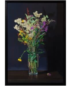 Vibrant mixed flower bouquet in a clear glass vase, displayed against a dark background at The Kildare Gallery.