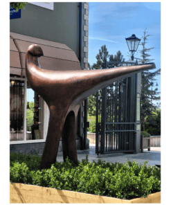 Bronze bird sculpture outside The Kildare Gallery, Irish contemporary art piece, modern outdoor installation.