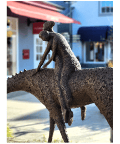 Bronze sculpture of a girl riding a horse, located outside The Kildare Gallery, Ireland.