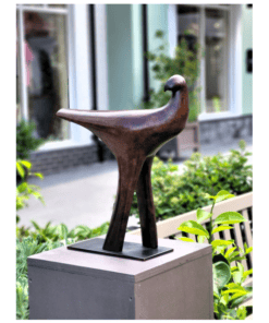 Unique bronze bird sculpture displayed outside The Kildare Gallery, showcasing contemporary Irish art.