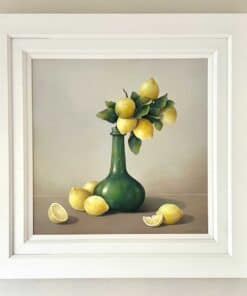 Lemon still life painting featuring lemons in a green vase, displayed in a white frame at The Kildare Gallery.