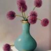 Vibrant pink allium flowers in a turquoise ceramic vase, showcasing contemporary art and floral arrangements at The Kildare Gallery.